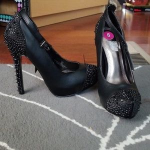 Brand New never worn back spiked 5" heels